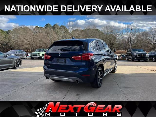 used 2018 BMW X1 car, priced at $19,689