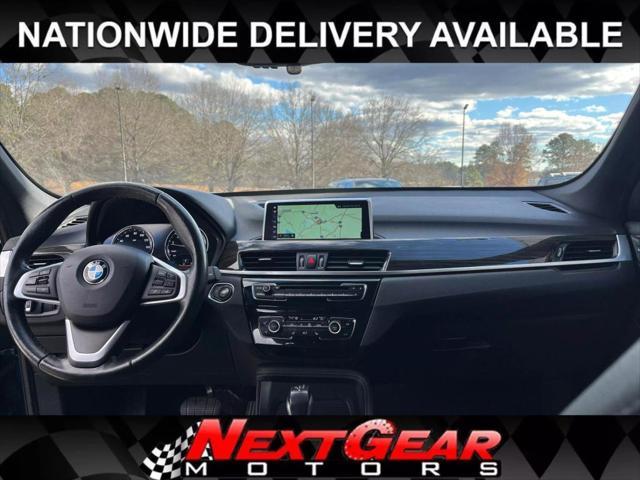 used 2018 BMW X1 car, priced at $19,689