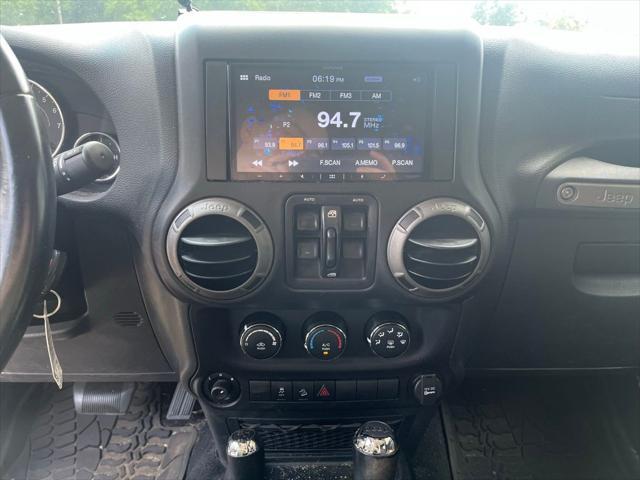 used 2016 Jeep Wrangler Unlimited car, priced at $17,990