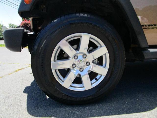 used 2015 Jeep Wrangler Unlimited car, priced at $24,850