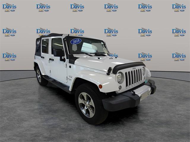 used 2018 Jeep Wrangler JK Unlimited car, priced at $22,341