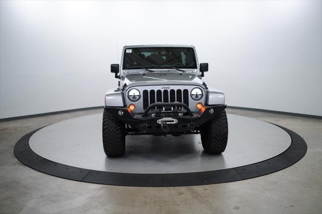 used 2013 Jeep Wrangler Unlimited car, priced at $25,000