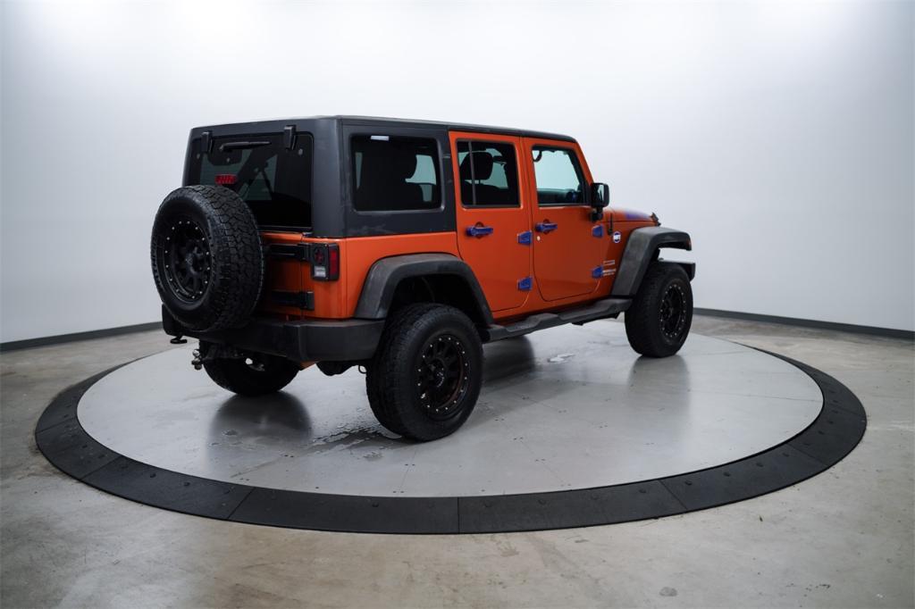 used 2011 Jeep Wrangler Unlimited car, priced at $13,000