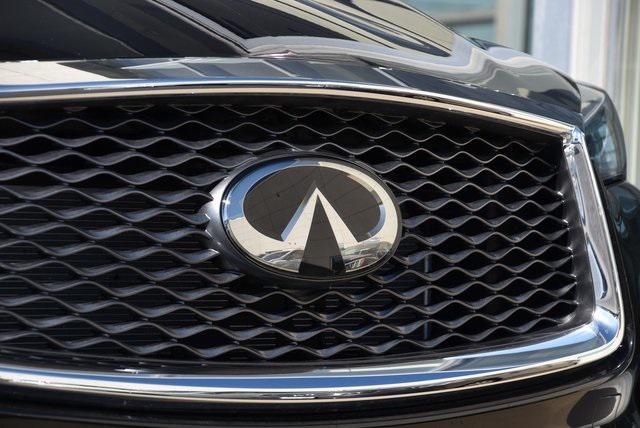 used 2025 INFINITI QX50 car, priced at $36,997