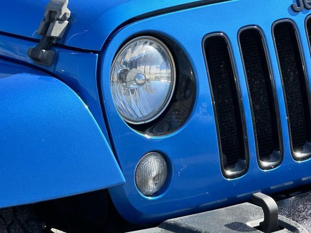 used 2015 Jeep Wrangler Unlimited car, priced at $12,875