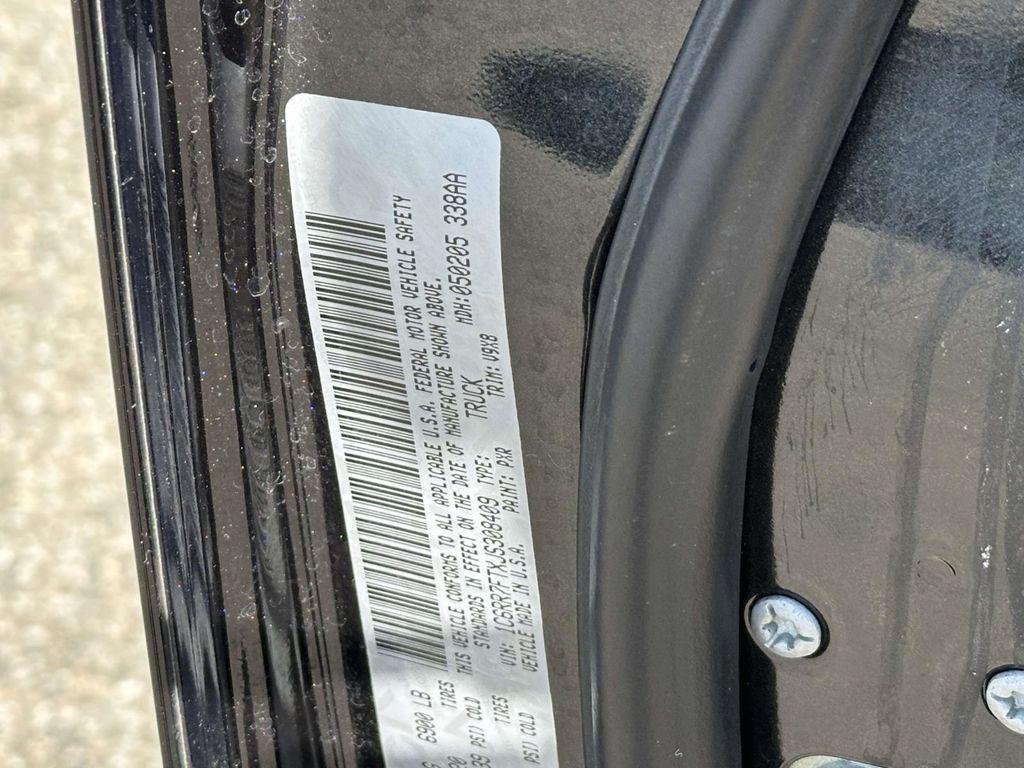 used 2018 Ram 1500 car, priced at $23,459