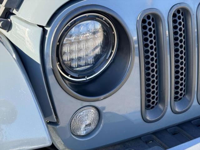 used 2015 Jeep Wrangler Unlimited car, priced at $14,355
