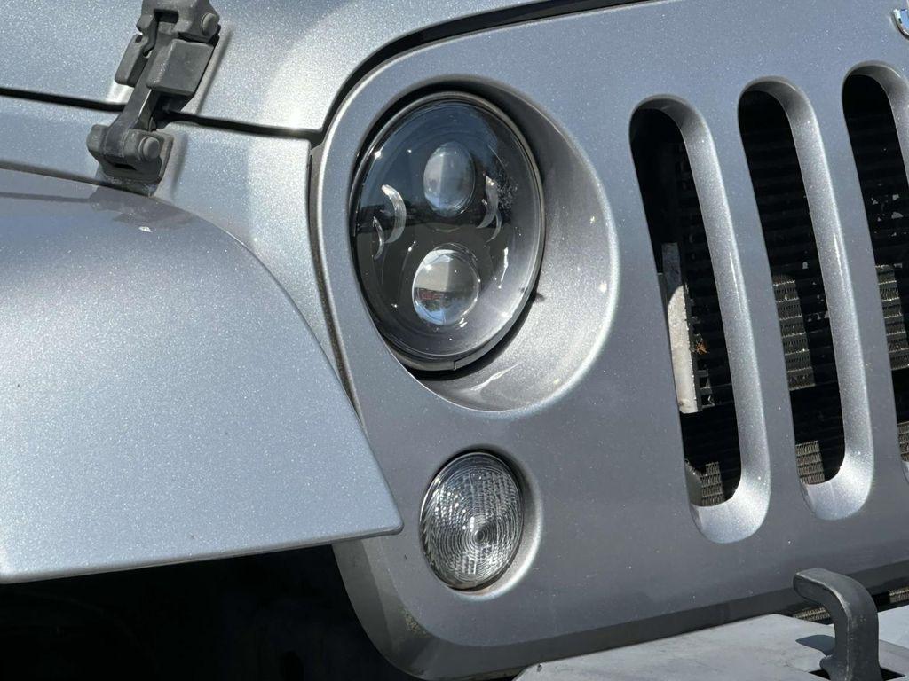 used 2015 Jeep Wrangler Unlimited car, priced at $17,495