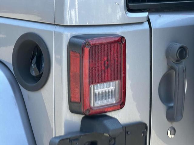 used 2015 Jeep Wrangler Unlimited car, priced at $17,495