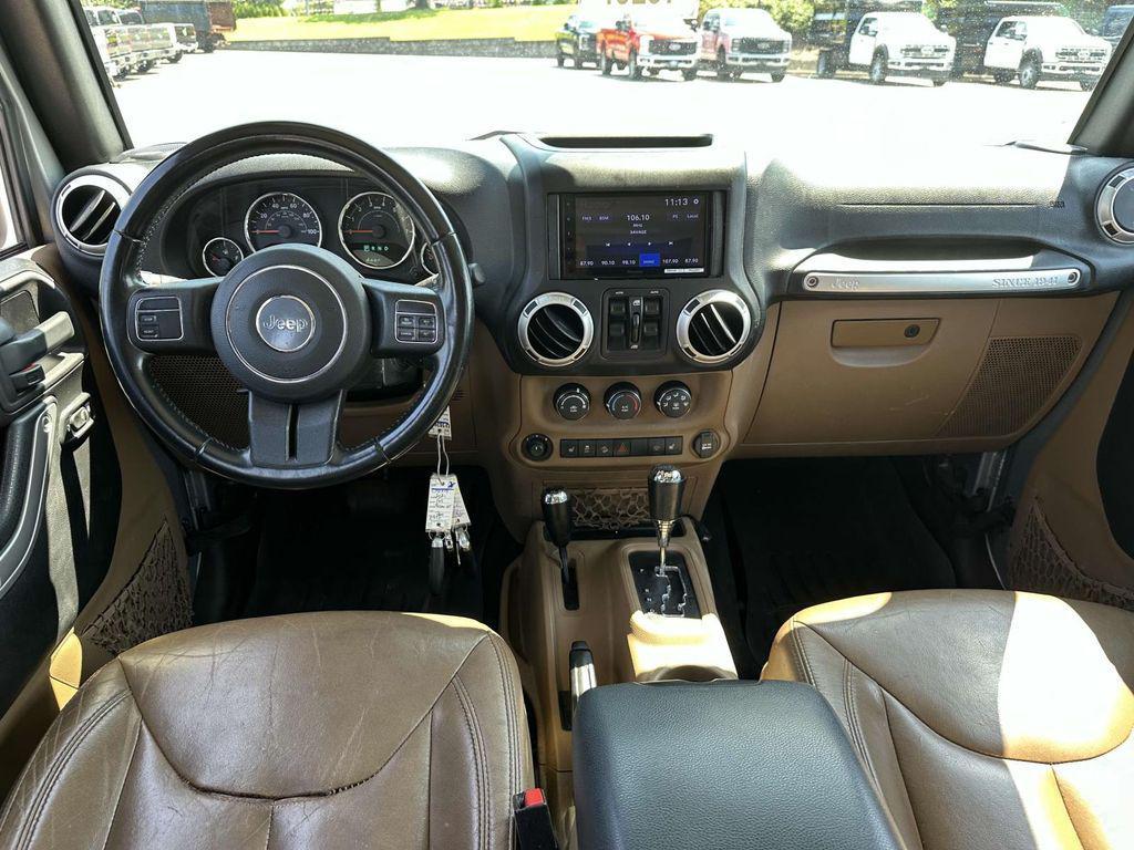 used 2015 Jeep Wrangler Unlimited car, priced at $17,495