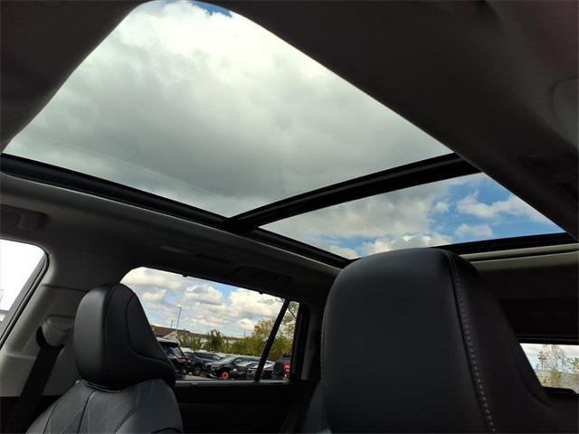 used 2025 Toyota Highlander Hybrid car, priced at $54,500