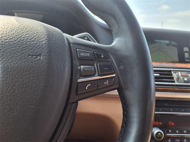 used 2015 BMW 740 car, priced at $10,995