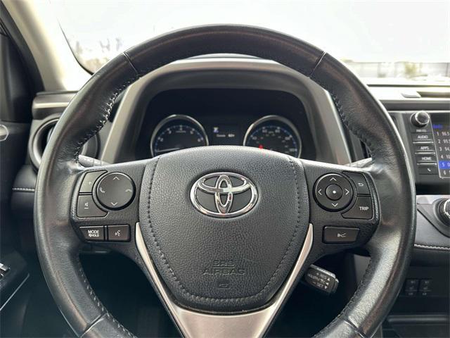 used 2018 Toyota RAV4 car, priced at $25,000