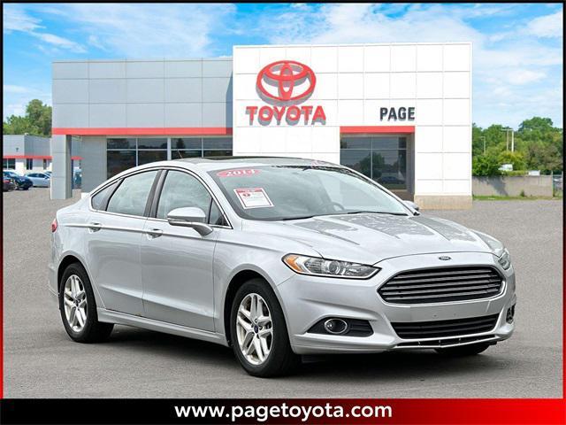 used 2014 Ford Fusion car, priced at $5,990