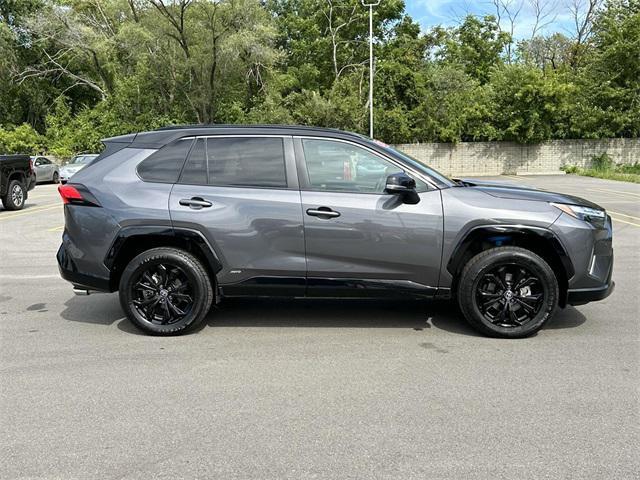 used 2022 Toyota RAV4 Hybrid car, priced at $28,000