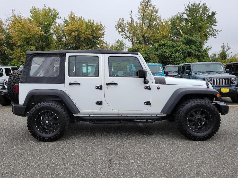 used 2015 Jeep Wrangler Unlimited car, priced at $20,163