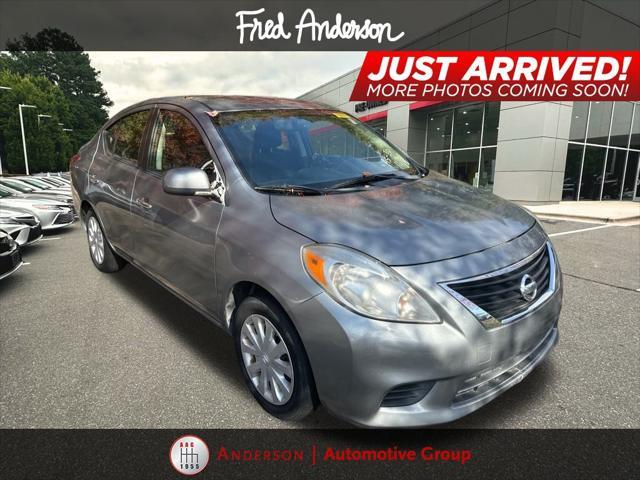 used 2013 Nissan Versa car, priced at $6,000