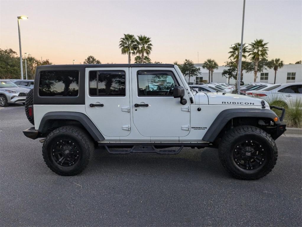 used 2015 Jeep Wrangler Unlimited car, priced at $21,831