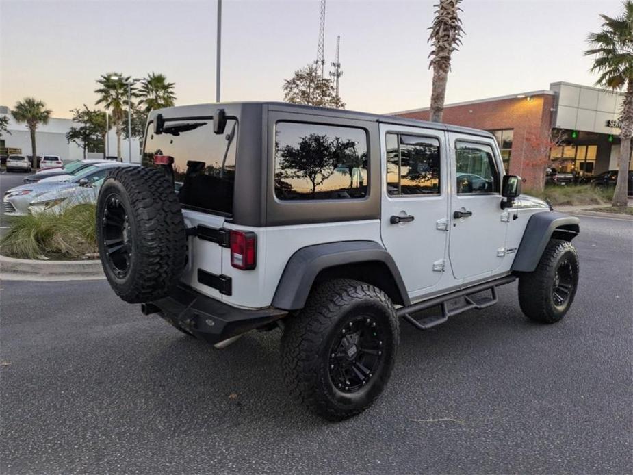 used 2015 Jeep Wrangler Unlimited car, priced at $21,831