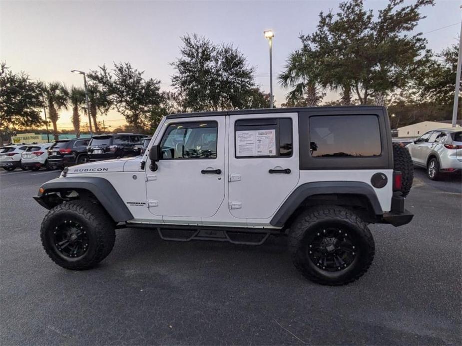 used 2015 Jeep Wrangler Unlimited car, priced at $21,831