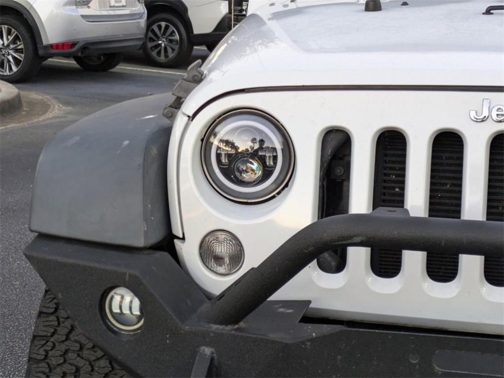 used 2015 Jeep Wrangler Unlimited car, priced at $21,831