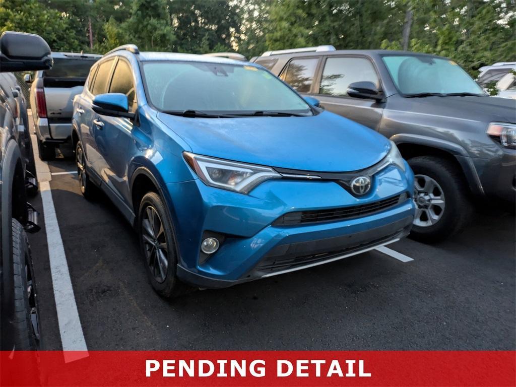used 2018 Toyota RAV4 car, priced at $24,231