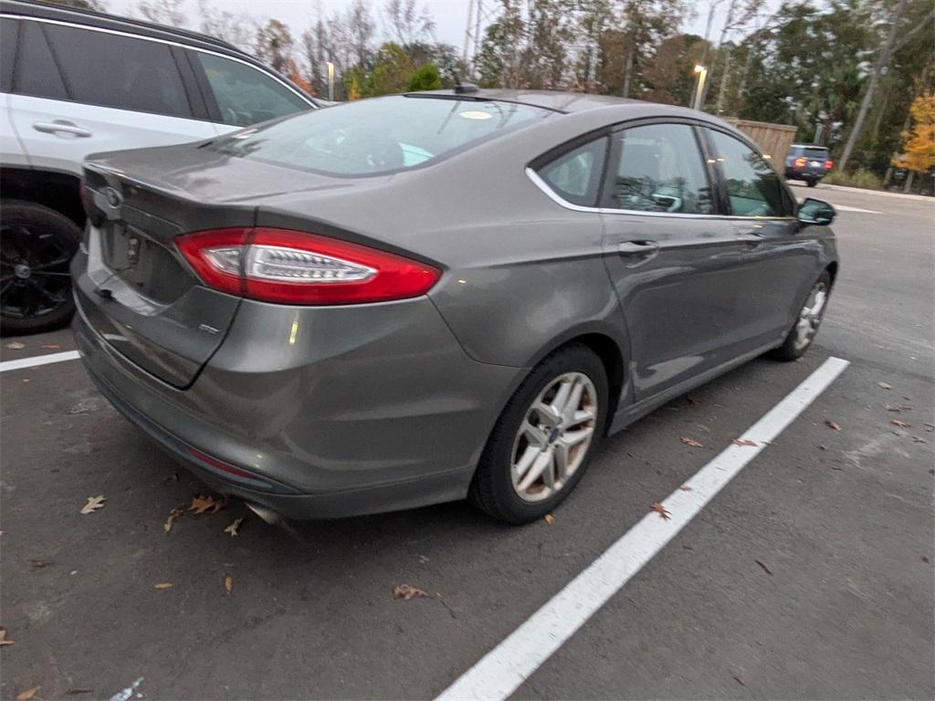 used 2013 Ford Fusion car, priced at $7,291
