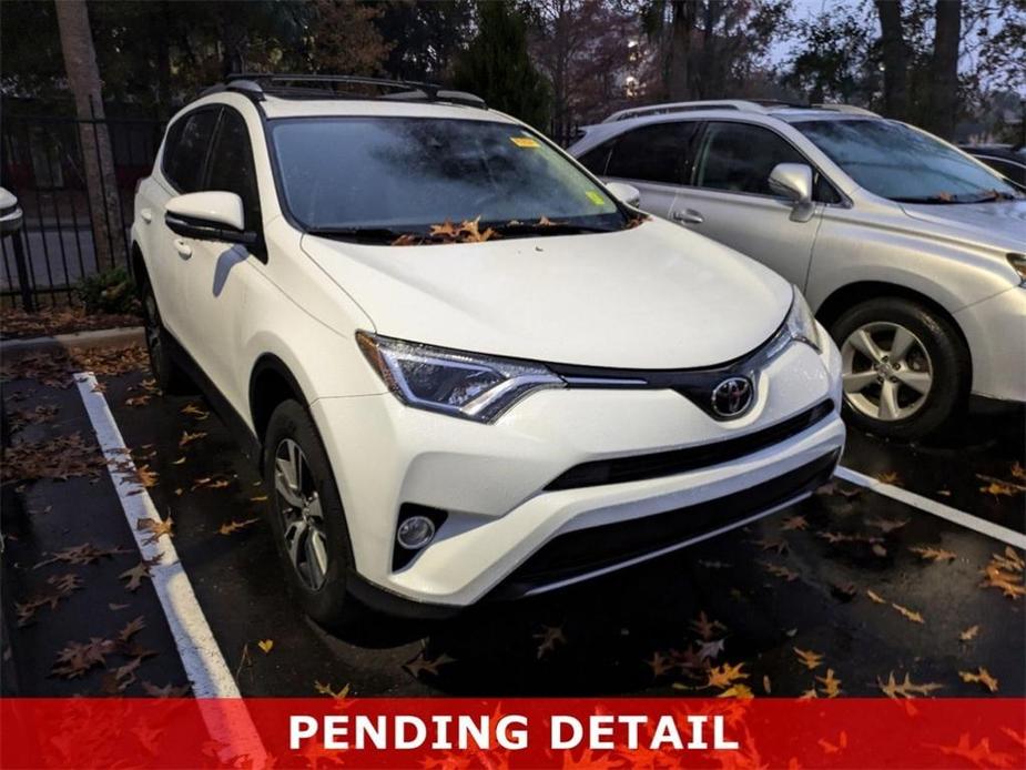 used 2018 Toyota RAV4 car, priced at $22,231