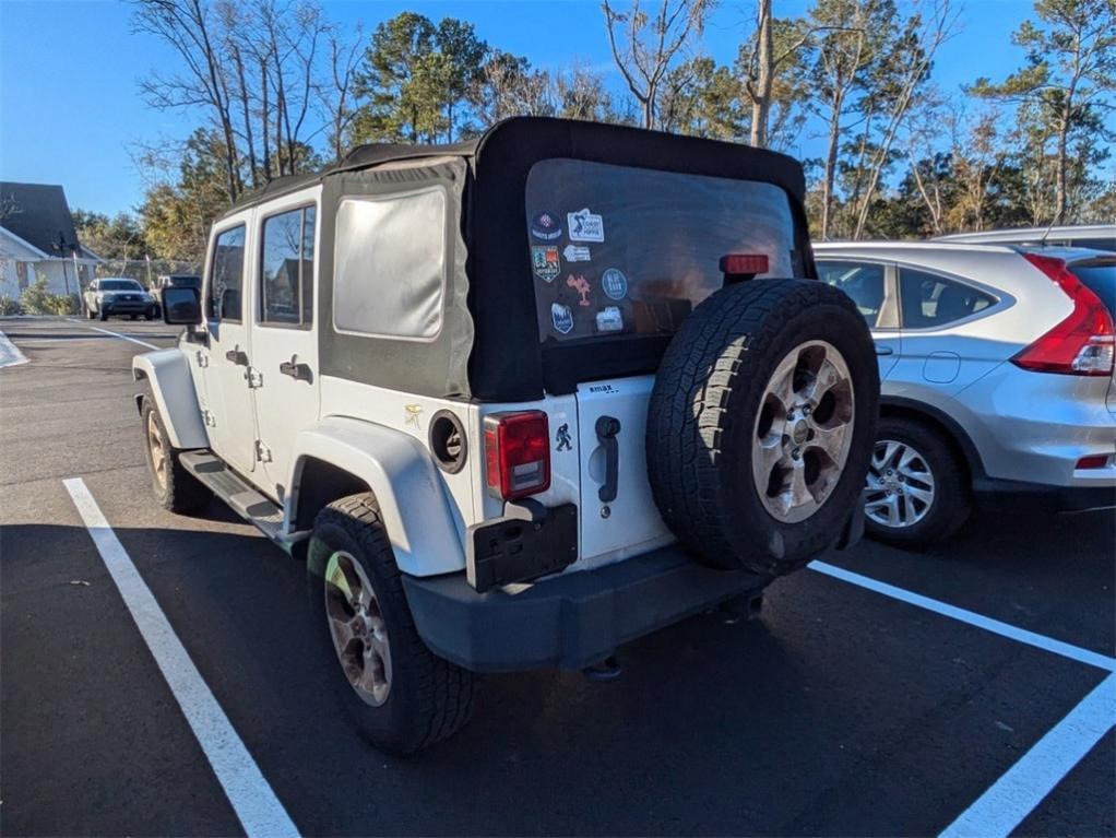 used 2013 Jeep Wrangler Unlimited car, priced at $19,531