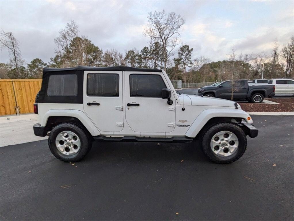 used 2013 Jeep Wrangler Unlimited car, priced at $18,431