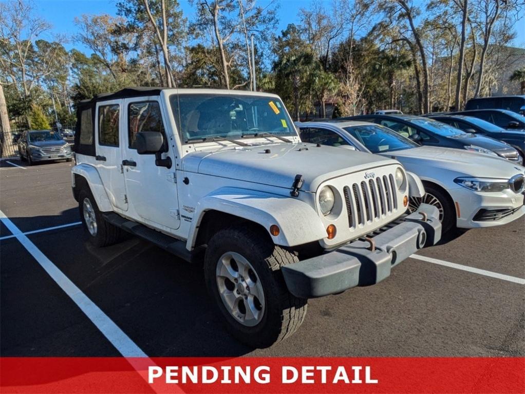 used 2013 Jeep Wrangler Unlimited car, priced at $19,531