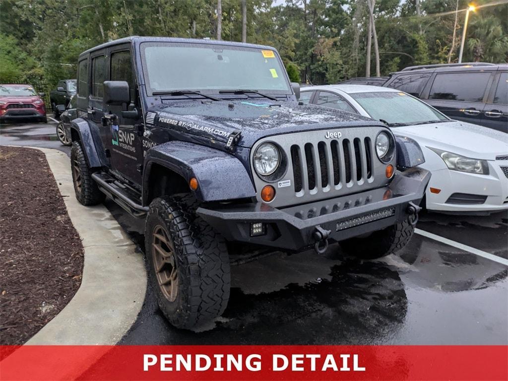 used 2013 Jeep Wrangler Unlimited car, priced at $14,831
