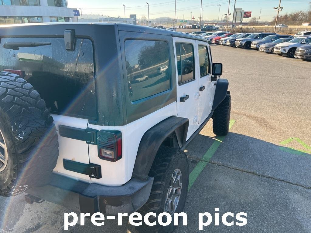 used 2014 Jeep Wrangler Unlimited car, priced at $21,900