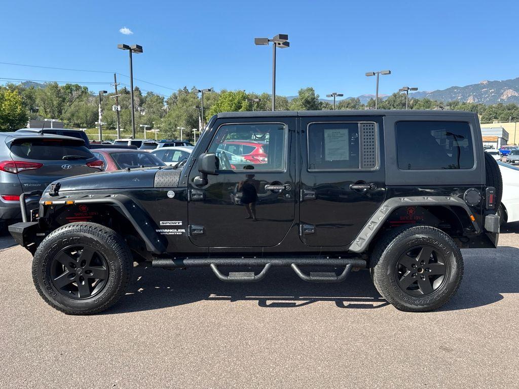 used 2011 Jeep Wrangler Unlimited car, priced at $15,889