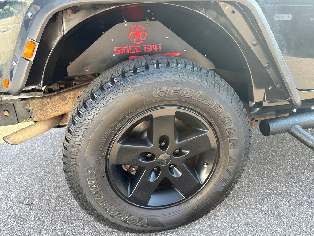 used 2011 Jeep Wrangler Unlimited car, priced at $15,889