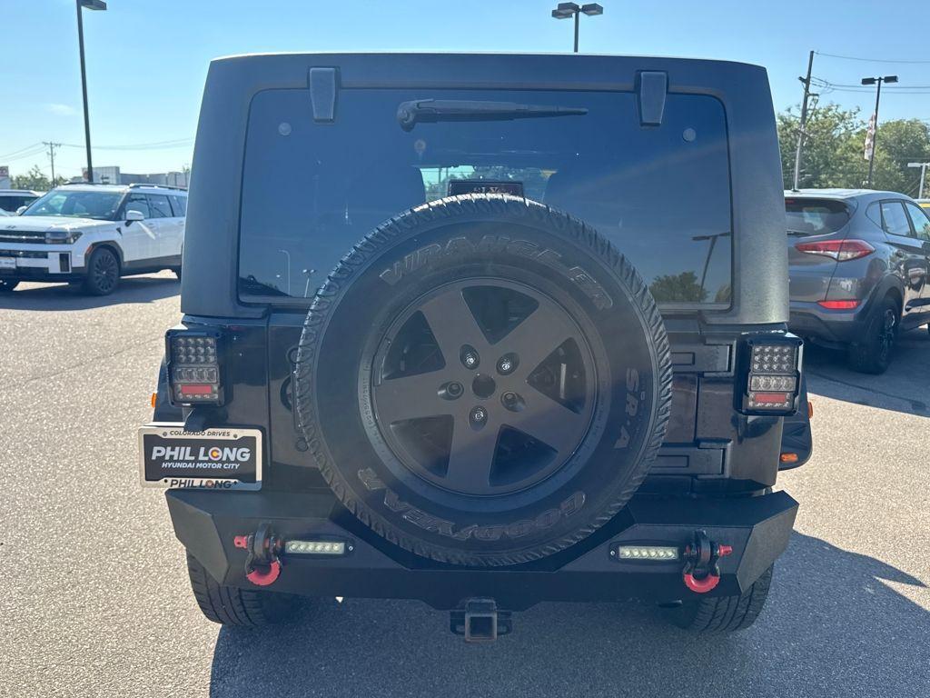 used 2011 Jeep Wrangler Unlimited car, priced at $15,889