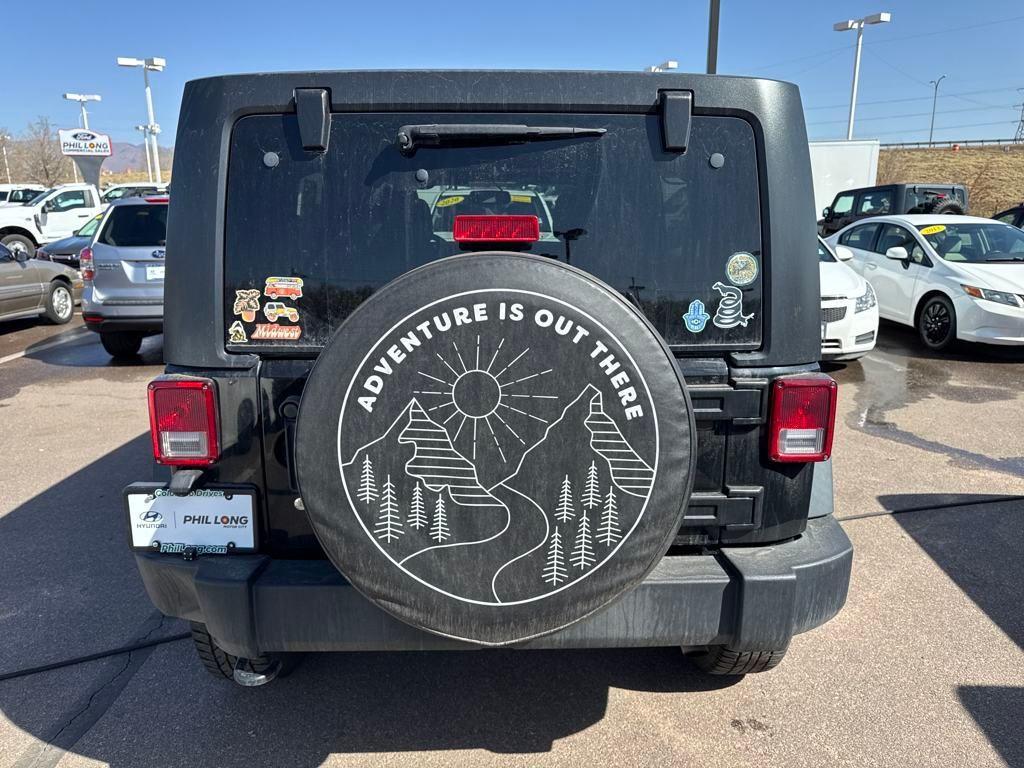 used 2014 Jeep Wrangler Unlimited car, priced at $15,892