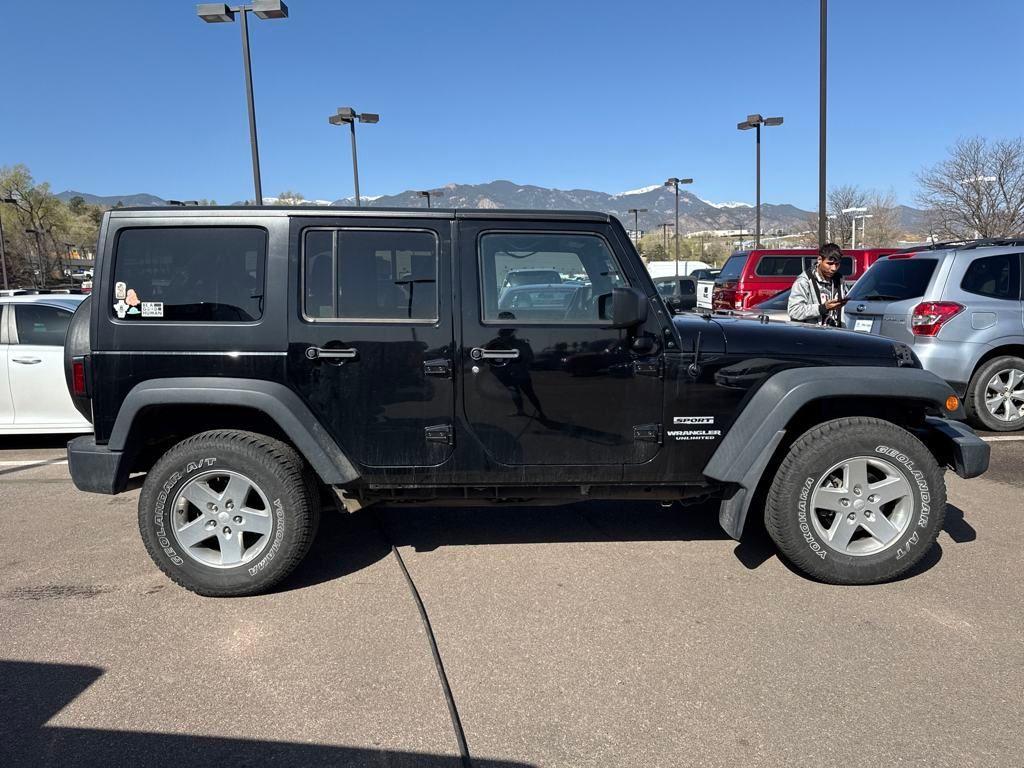 used 2014 Jeep Wrangler Unlimited car, priced at $15,892