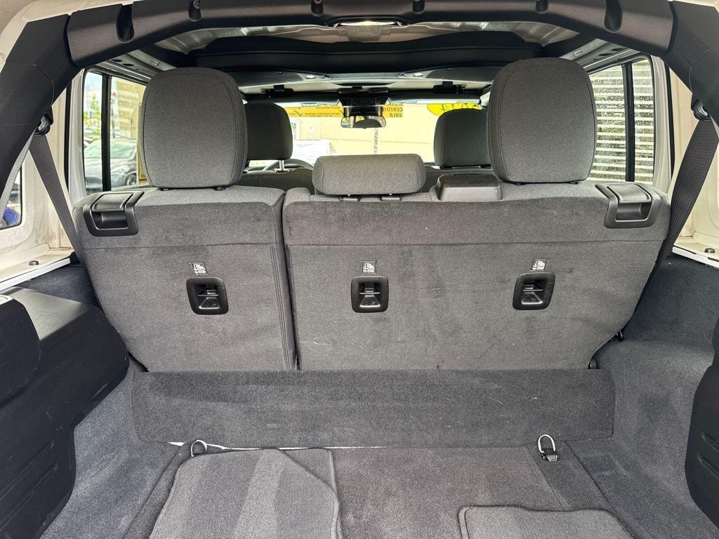 used 2024 Jeep Wrangler 4xe car, priced at $33,993