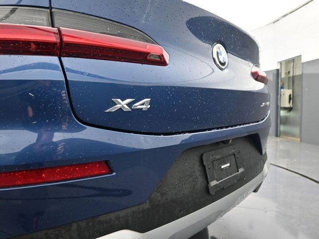 used 2022 BMW X4 car, priced at $34,928