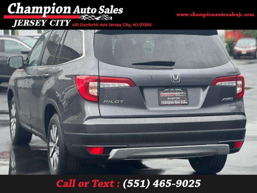 used 2022 Honda Pilot car, priced at $27,495