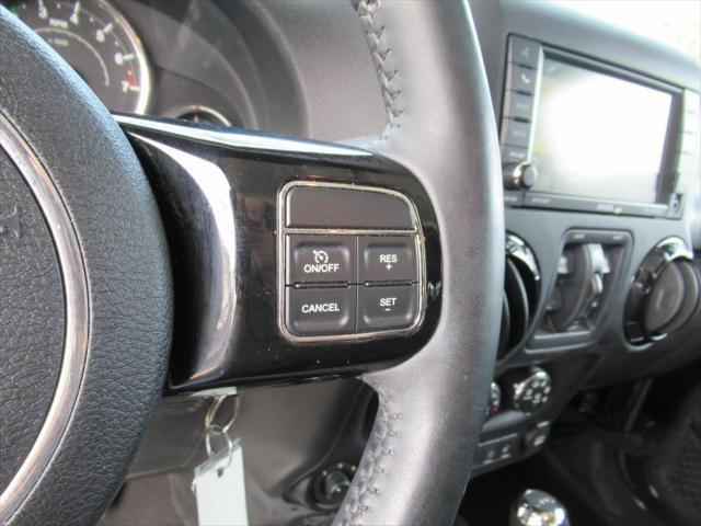 used 2015 Jeep Wrangler Unlimited car, priced at $22,049