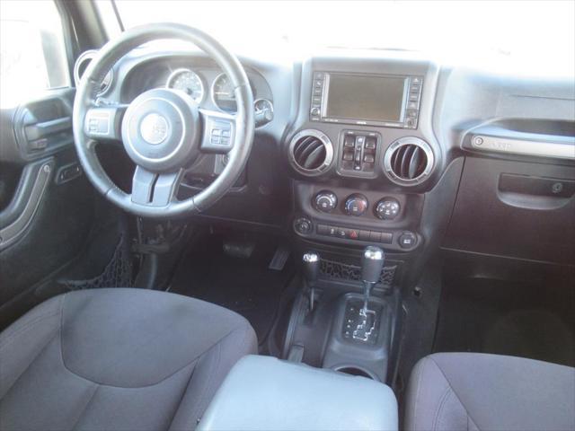 used 2015 Jeep Wrangler Unlimited car, priced at $17,352