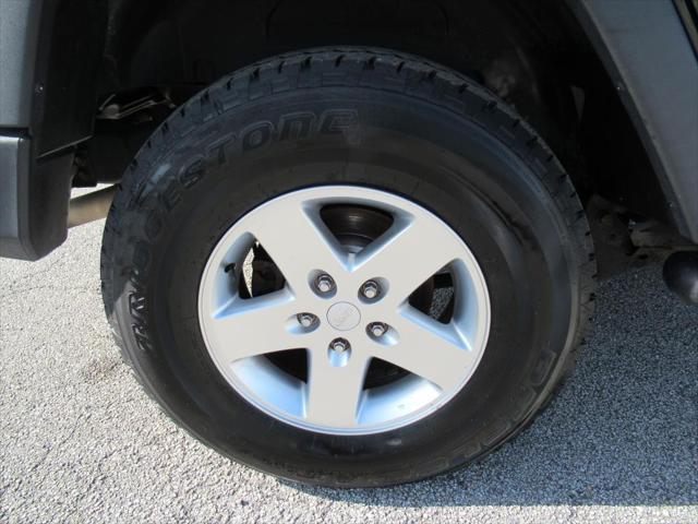 used 2015 Jeep Wrangler Unlimited car, priced at $17,352