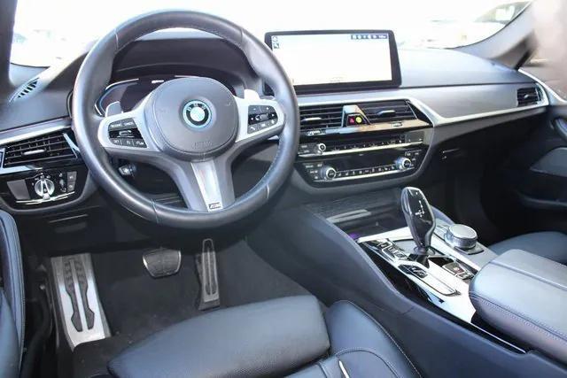 used 2023 BMW 530e car, priced at $34,400