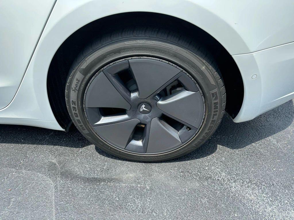 used 2022 Tesla Model 3 car, priced at $23,500