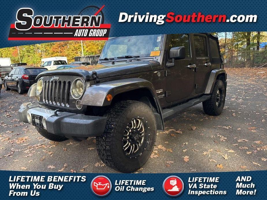 used 2014 Jeep Wrangler Unlimited car, priced at $19,340