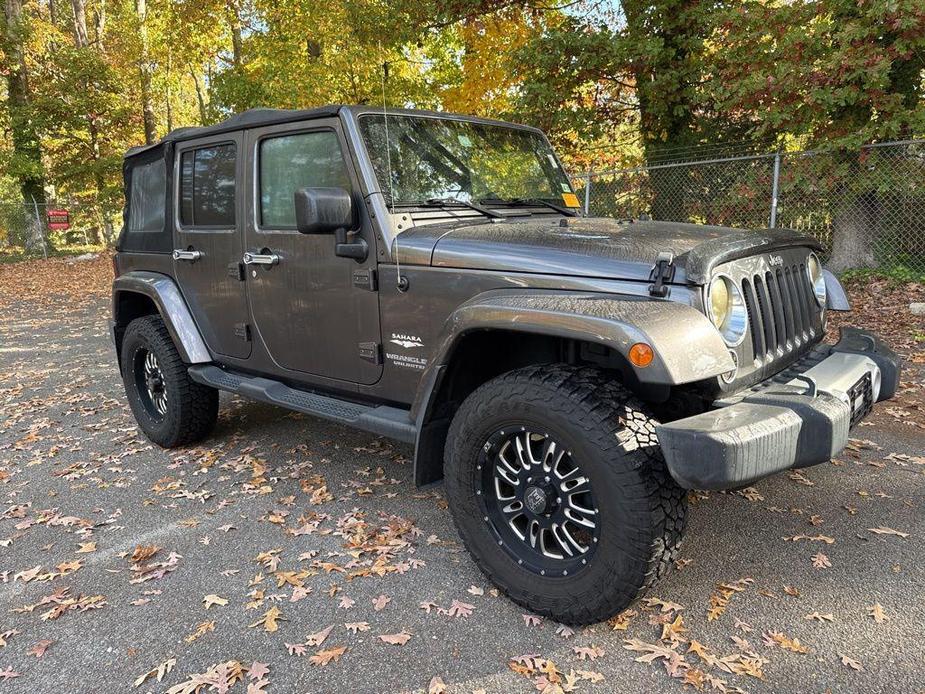 used 2014 Jeep Wrangler Unlimited car, priced at $19,340