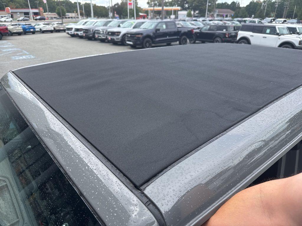 used 2021 Jeep Wrangler Unlimited car, priced at $36,136