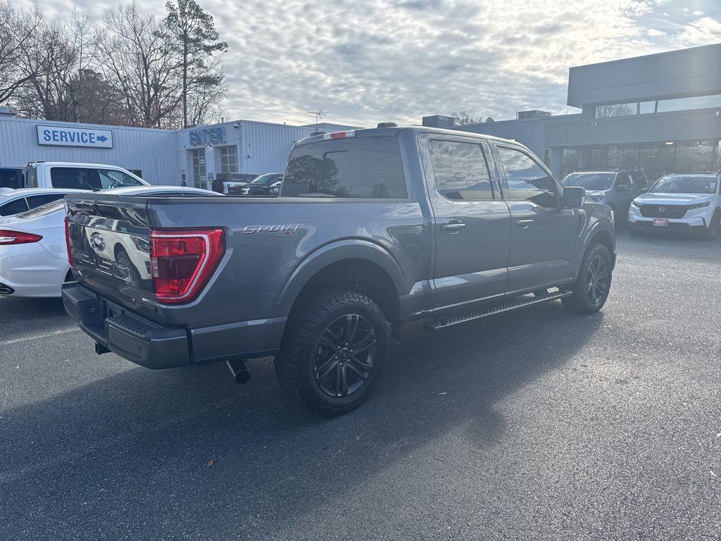 used 2021 Ford F-150 car, priced at $34,143